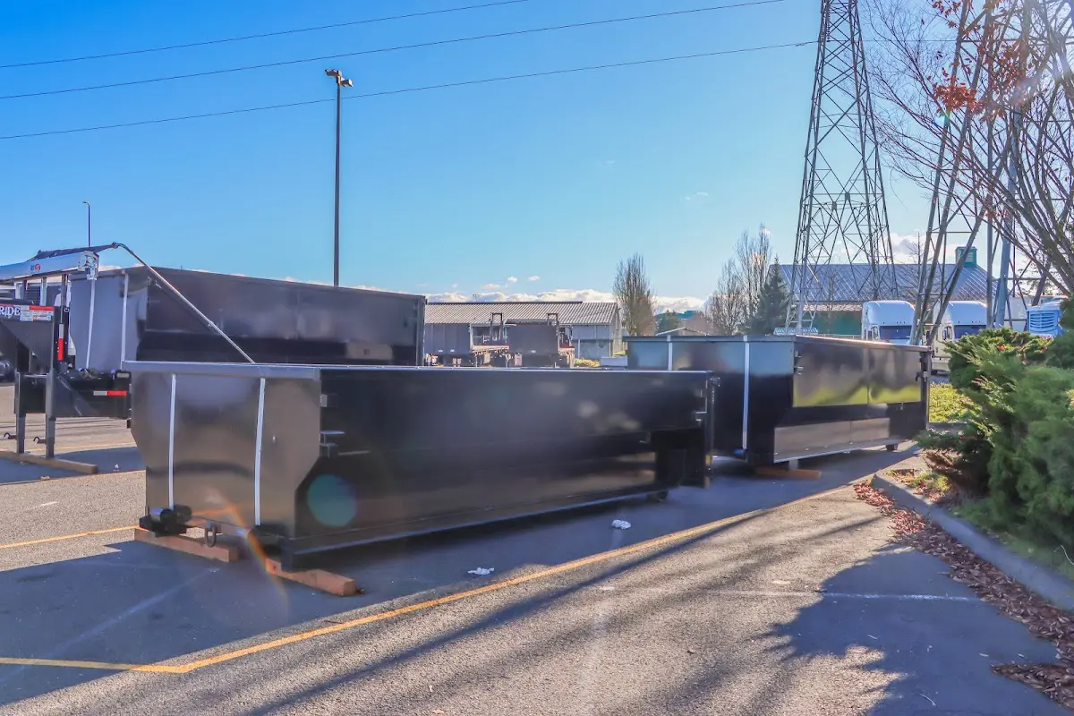 Roll-off dumpster ready for waste disposal at job site for 2 Yard Dumpster Rental in Greenwood